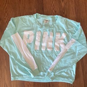 Women’s size medium teal in color longsleeved T-shirt PINK brand